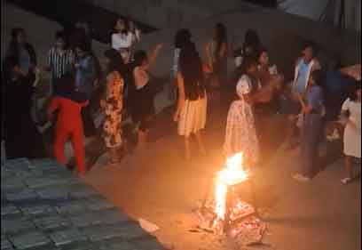 Night campfire activities at Sun Mount View Hotels Pallivasal